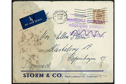 Britisk 5d George VI på beskadiget luftpostbrev fra London d. 5.10.1945 til København, Danmark. Fejlagtigt stemplet Indgaaet med Mangel af Frimærke som er overstreget og tilføjet nyt stempel Indgaaet beskadiget / Østerbro Postkontor.