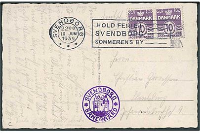 10 øre Bølgelinie i parstykke på brevkort annulleret med TMS Hold ferie i Svendborg sommerens by/ Svendborg d. 19.6.1939 til Flensburg, Tyskland. Privat stempel: Svendborg Banegaard.