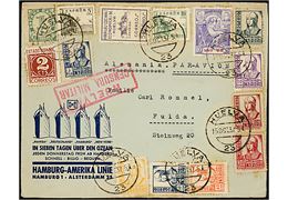 Blandingsfrankeret fortrykt Hamburg-Amerika Linie kuvert sendt som luftpost fra Huelva d. 15.10.1937 til Fulda, Tyskland. Lokal spansk censur fra Huelva.