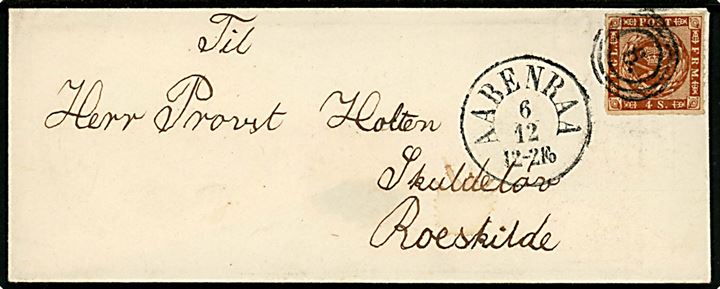 4 sk. Stukken kant på brev annulleret med nr.stempel 6 og sidestemplet lapidar Aabenraa d. 6.12.1863 til Skuldelöv pr. Roeskilde.