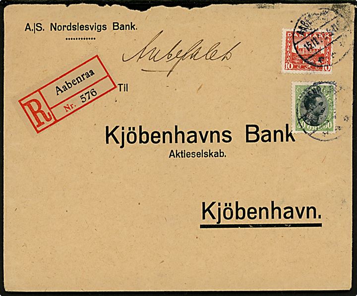 10 øre Genforening og 30 øre Chr. X på fortrykt kuvert fra A/S Nordslesvigs Bank sendt anbefalet og annulleret med brotype IVb Aabenraa d. 15.11.1920 til København.