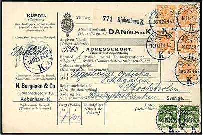 10 øre Bølgelinie (2) og 30 øre Chr. X (5) på 170 øre frankeret internationalt adressekort for pakke fra København d. 10.11.1923 til Stockholm, Sverige.