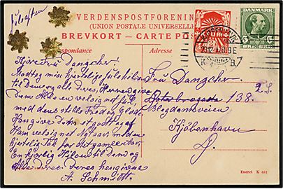 5 øre Chr. IX og 2 øre K.F.U.M. mærkat på brevkort i Kjøbenhavn d. 23.12.1906. Påskrevet Juleaften.