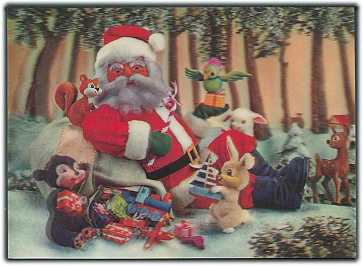3D kort med julemanden der sidder med skovens dyr. Uden adresselinier. Wonder Co, Tokyo. PAT591210. 14,5 x 10,5 cm. 