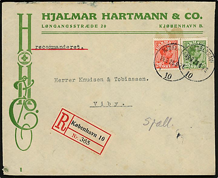 20 øre og 25 øre Chr. X på illustreret firmakuvert fra Hjalmar Hartmann & Co. sendt anbefalet fra Kjøbenhavn 10 d. 14.9.1926 til Viby Sjælland. Skrammer på bagsiden.