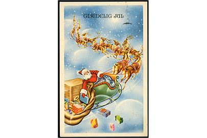 Julemand i kane trukket af rensdyr. W. Levison serie 3017.