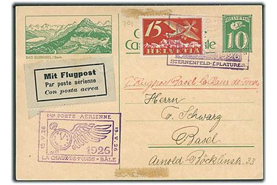 10 c. illustrertet helsagsbrevkort opfrankeret med 15 c. Luftpost og sendt med 1. flyvning med med særstempel 1. Flugpost 15.V.26 Sternenfeld Eplatures og sidestemplet La Chaux de Fonds - Bale til Basel. 
