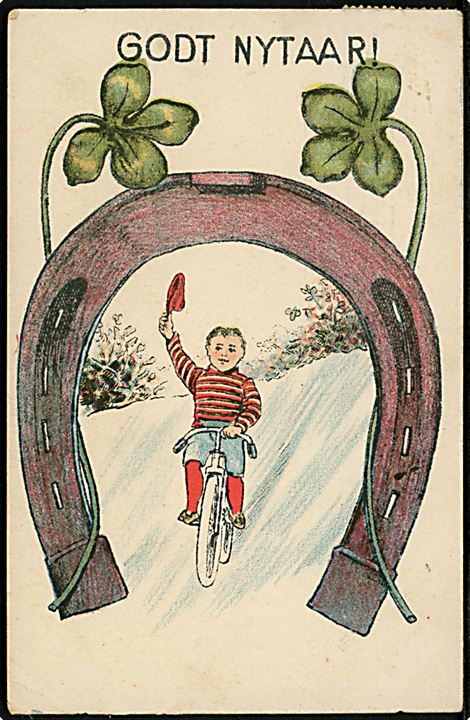 Nytårskort med dreng på cykel som køre gennem hestesko med firkløver. U/no.