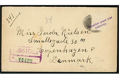 Amerikansk anbefalet brev uden frimærke og violet stempel “Frimærke gaaet tabt undervejs” fra Savannah d. 16.10.1922 via New York til Kjøbenhavn, Danmark. Ank.stemplet Kjøbenhavn d. 30.10.1922.