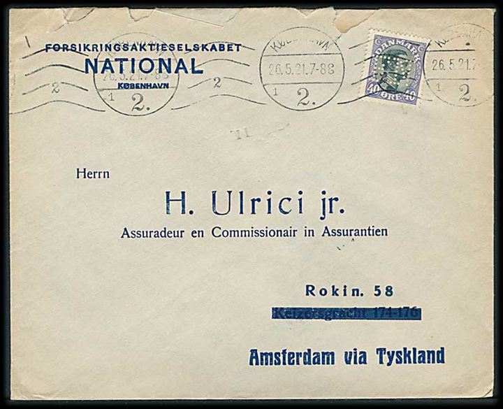 40 øre Chr. X med perfin F.N. på fortrykt firmakuvert Forsikringsaktieselskabet National fra Kjøbenhavn d. 26.5.1921 til Amsterdam, Holland. Rifter i toppen.