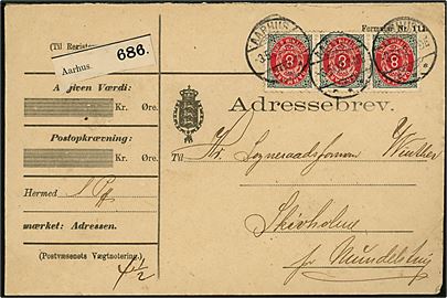 8 øre Tofarvet (3) omv. rm. på 24 øre frankeret adressebrev for pakke fra Aarhus d. 3.5.1902 til Mundelstrup.