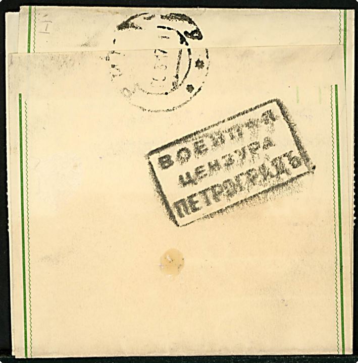 5 øre Chr. X helsagskorsbånd fra Berlingske Tidende i Kjøbenhavn d. 30.3.1917 til Riga, Rusland. På bagsiden russisk censur fra Petrograd.