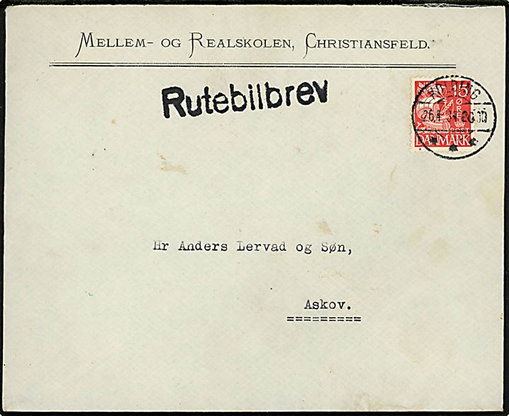 15 øre Karavel på brev fra Christiansfeld Mellem- og Realskole annulleret Kolding d. 26.4.1934 og sidestemplet Rutebilbrev til Askov.