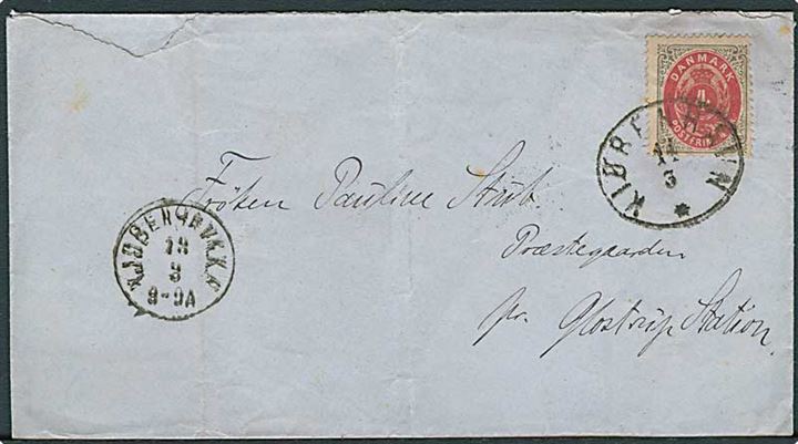 4 sk. Tofarvet på brev annulleret med ovalt overnatningsstempel Kiøbenhavn d. 14.3.187x til Glostrup.