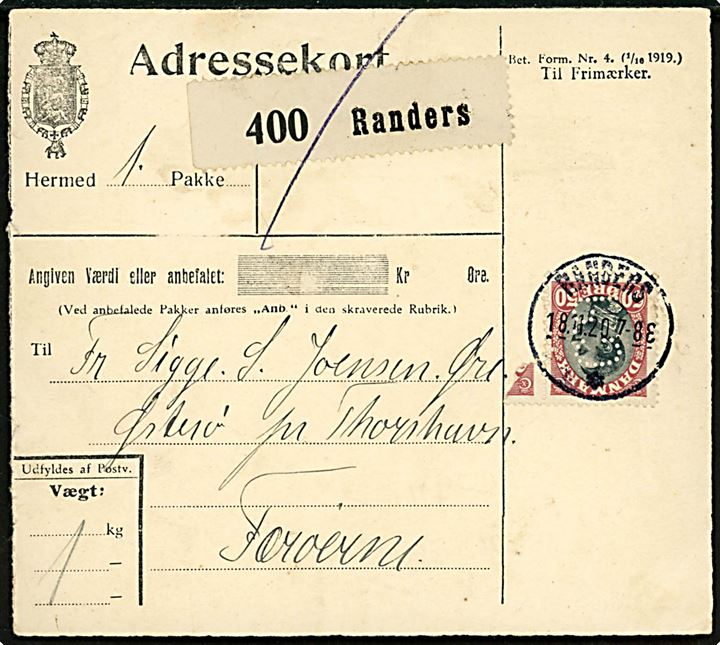 50 øre Chr. X med perfin C.J. (= firma Chr. Juncher A/S) single på adressekort for pakke fra Randers d. 18.11.1920 til Øre på Østerø, Færøerne. På bagsiden transit stemplet brotype IIIb Thorshavn d. 4.12.1920 og noteret udleveret d. 6.12.1920.