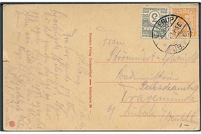 3 øre Bølgelinie og 7 øre Chr. X på brevkort annulleret med bro IIa Hellerup JB.P.E. d. 15.11.1920 til Travemünde, Tyskland. 