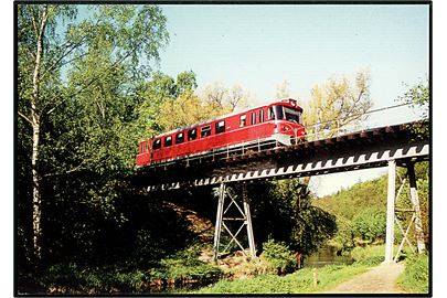 Toget fra Nærumbanen ved Mølleåbroen. Forlaget Holsund u/no. 