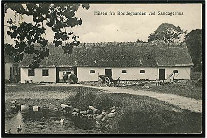 Sandagerhus, Bondegård. M. & J. Bach no. 3857. Frankeret med 5 øre Fr. VIII annulleret med stjernestempel SAUNTE og sidestemplet svagt bureaustempel Helsingør - Hornbæk T.6 d. 22.7.1907 til Kolding.