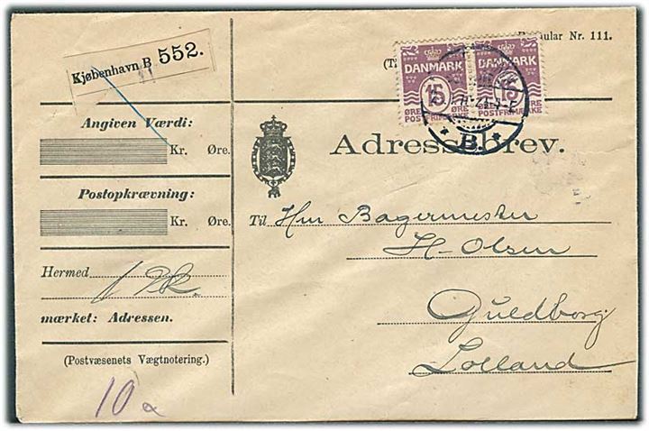 15 øre Bølgelinie i parstykke på adressebrev for pakke fra Kjøbenhavn d. 28.1.1910 til Guldborg på Lolland.