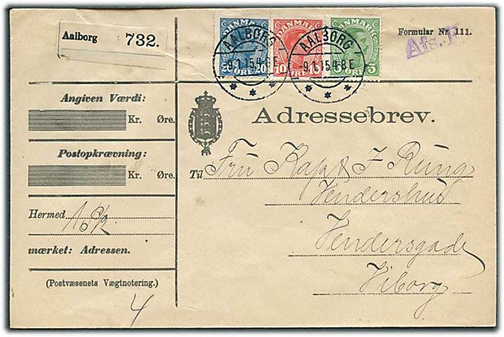 5 øre, 10 øre og 20 øre Chr. X på adressebrev for pakke fra Aalborg d. 9.1.1915 til Viborg. Stemplet Afs.F. (Afsenders frankering).