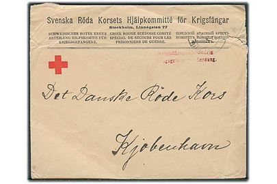Ufrankeret fortrykt kuvert fra Svenska Röda Korsets Hjälpkomitté för Krigsfångar i Stockholm 1917 til Dansk Røde Kors i København. Skader i højre hjørne.
