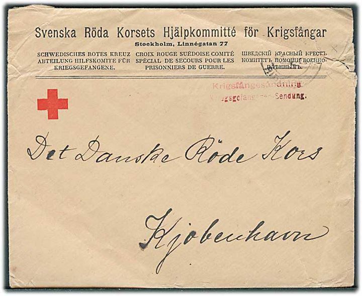 Ufrankeret fortrykt kuvert fra Svenska Röda Korsets Hjälpkomitté för Krigsfångar i Stockholm 1917 til Dansk Røde Kors i København. Skader i højre hjørne.