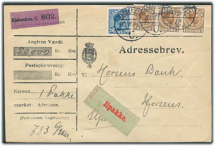 20 øre og 1 kr. (3-stribe) Chr. X på 3,20 kr. frankeret adressebrev for værdi-ilpakke fra Kjøbenhavn d. 22.2.1915 til Horsens.