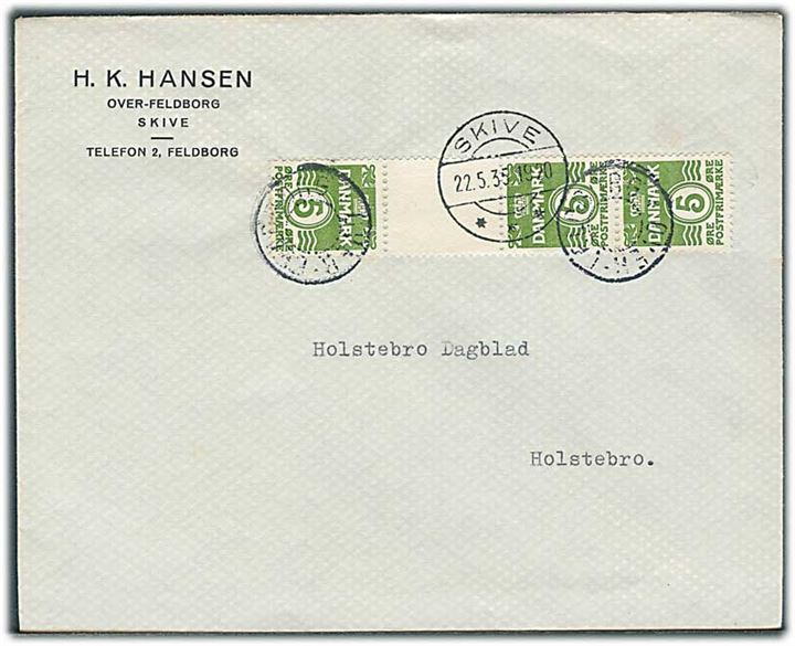 5 øre Bølgelinie i tête-bêche 4-stribe med mellemstykke på brev annulleret med udslebet stjernestempel OVER-FELDBORG og sidestemplet Skive d. 22.5.1935 til Holstebro.
