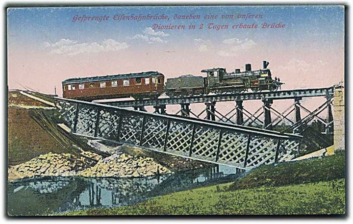 Sprængt jernbanebro. Toget kører på broen ved siden. (Pionieren in 2 Tagen erbaute Brüche). E. H. & Co. i. B. no. 111. 