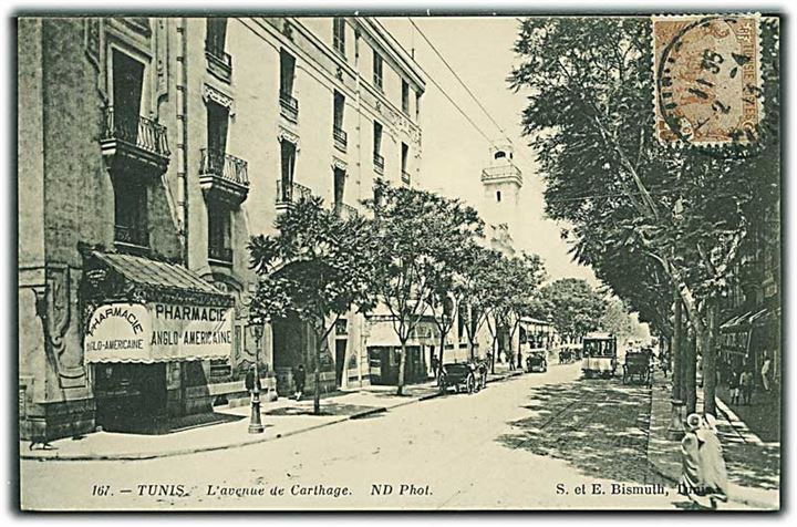 Tunis - L'avenue de Carthage. Pharmacie Anglo Americaine ses til venstre. Sporvogn no. 73 på vejen. S. et. E. no. 167. 