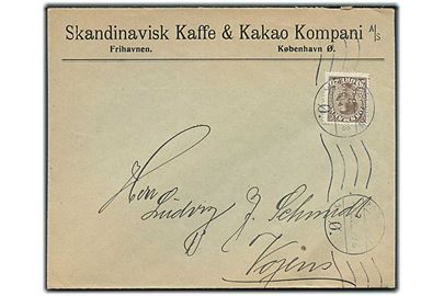 20 øre Chr. X med perfin “F.K.” på firmakuvert fra Snakdinavisk Kaffe & Kakao Kompani A/S, Frihavnen på brev fra København d. 1.5.1922 til Vojens.