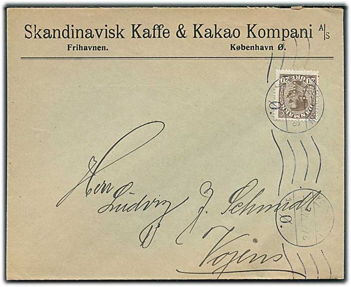 20 øre Chr. X med perfin “F.K.” på firmakuvert fra Snakdinavisk Kaffe & Kakao Kompani A/S, Frihavnen på brev fra København d. 1.5.1922 til Vojens.