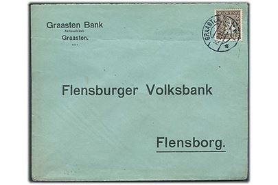 20 øre Chr. IV Postjubilæum med perfin “GB” på grænseportobrev fra Graasten Bank i Graasten d. 10.2.1925 til Flensburg, Tyskland.