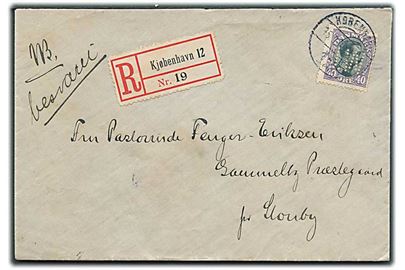 40 øre Chr. X med perfin “J.W.” (J. Weidemann) single på anbefalet brev fra København d. 15.9.1919(?) til Stouby. På bagsiden laksegl fra Viggo Kallerup, som var prokurist i firmaet J. Weidemann.