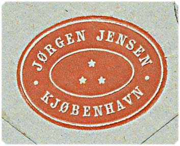 8 øre tofarvet på brev fra København d. 5.8.18xx til Odense. Mærket med perfin J12 - Jørgen Jensen.