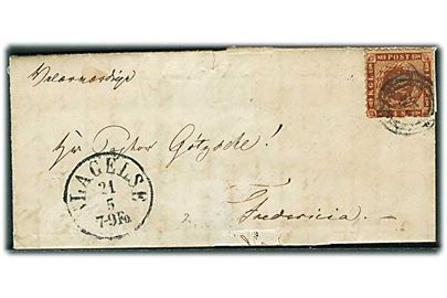 4 sk. stukken kant på brev annulleret med nr.stempel 65 og sidestemplet antiqua Slagelse d. 21.5.1863 til Fredericia. Noget slidt med div. mangler.