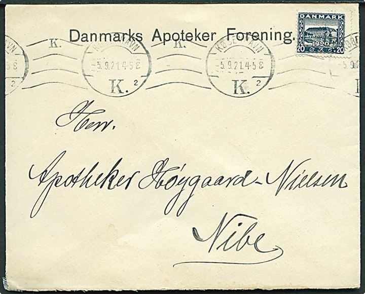 20 øre Genforening med perfin AB (Alfred Benzon) på firmakuvert fra Danmarks Apoteker Forening i København d. 5.9.1921 til Nibe.