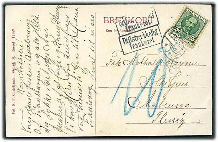 5 øre Fr. VIII på underfrankeret brevkort (Gadeparti med købmand og jernbanestation i Ørbæk) fra Ørbæk d. 23.10.1907 til Aabenraa, Nordslesvig. Rammestempel Utilstrækkelig frankeret og udtakseret i 10 pfg. tysk porto.