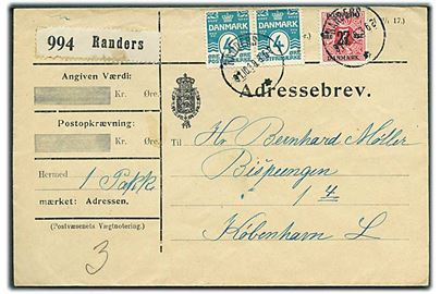 4 øre Bølgelinie i parstykke og 27/7 øre Provisorium på adressebrev for pakke fra Randers d. 31.10.1918 til København.