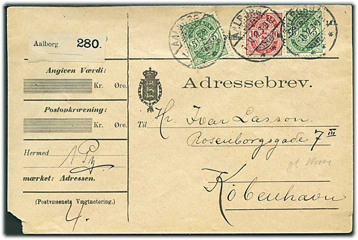 5 øre (2) og 10 øre Våben på adressebrev for pakke fra Aalborg d. 1.11.1902 til København. Mgl. venstre hjørne.