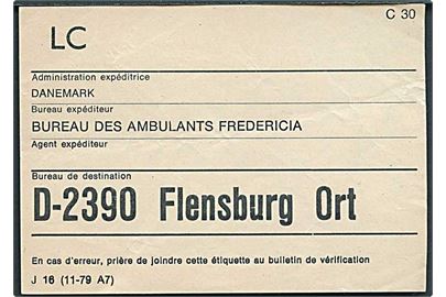 Brevbundt seddel J 16 (11-79 A7) fra Jernbanepostkontoret i Fredericia til D-2390 Flensburg Ort.