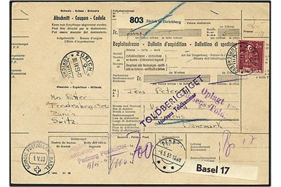2 frank på pakkefølgeseddel fra Zürich, Schweiz, d. 30.4.1953 til Horsens. Diverse stempler angående forsendelsen.