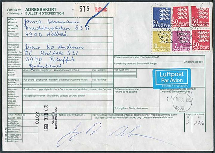 7 kr., 10 kr., 20 kr. og 50 kr. (3) Rigsvåben på adressekort for luftpostpakke annulleret med postsparestempel Holbæk d. 14.12.1991 til Pituffik, Grønland. 2 mærke med skader.