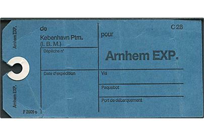 Blå sækkemærkat F2005c fra København Ptm (I.B.M.) til Arnhem i Holland. Folder.