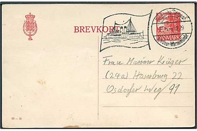 15 øre Karavel helsagsbrevkort (fabr. 92-H) annulleret med tysk skibsstempel Deutsche Seepost Gjedser-Warnemünde d. 6.12.1929 til Hamburg, Tyskland.