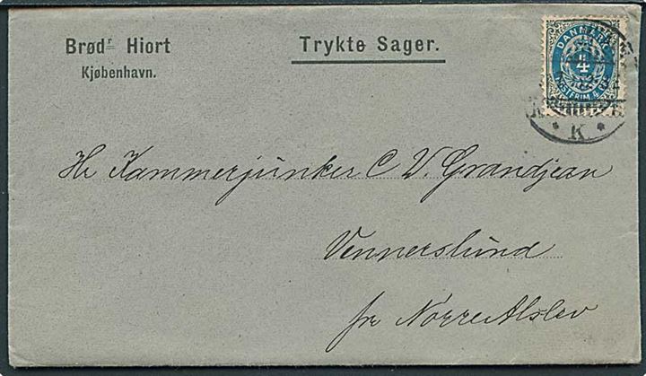 4 øre Tofarvet omv. rm. på tryksag fra Kjøbenhavn d. x.7.1896 til Vennerslund pr. Nørre Alslev.