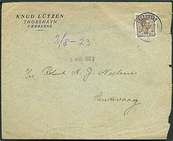 20 øre Chr. X på brev annulleret med brotype IIIb Thorshavn d. 2.8.1923 til Sandevaag. Revet i højre side.
