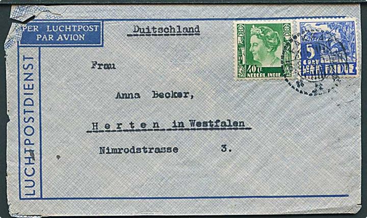 Hollandsk Ostindien. 5 c. og 40 c. frankeret luftpostbrev fra Fak-Fak (New Guinea) d. 6.8.1938 til Herten, Tyskland. Hjørneskade.