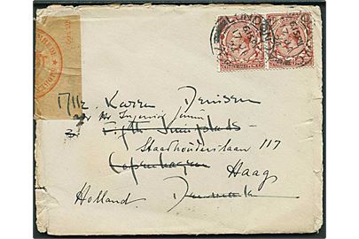 Engelsk 1½d George V i parstykke på brev fra London d. 17.1.1924 til København, Danmark - eftersendt til Haag, Holland. Beskadiget og lukket med mærkat Opm 135 Kjøbenhavns Overpostmesterembede.