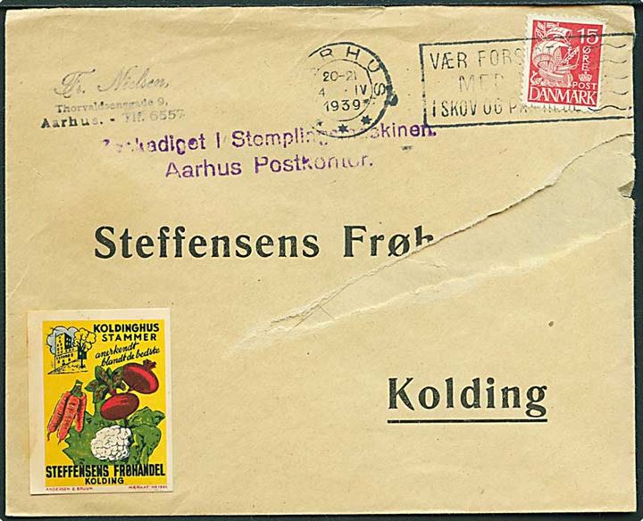 15 øre Karavel på brev fra Aarhus d. 4.4.1939 til Kolding. Stemplet: Beskadiget i Stemplingsmaskinen / Aarhus Postkontor.